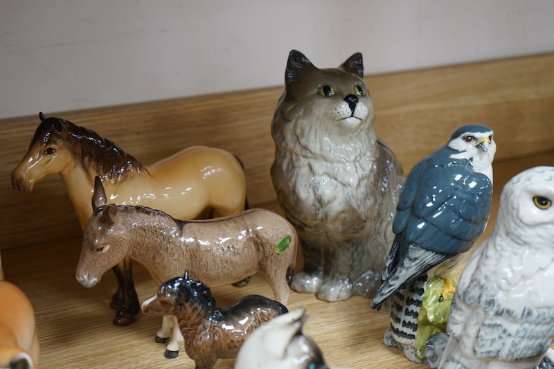 A collection of Russian, Beswick, Doulton and other animal ornaments. Condition - varies